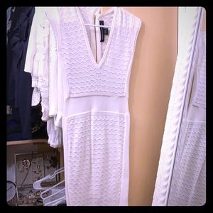 Off white dress cotton material. Never worn